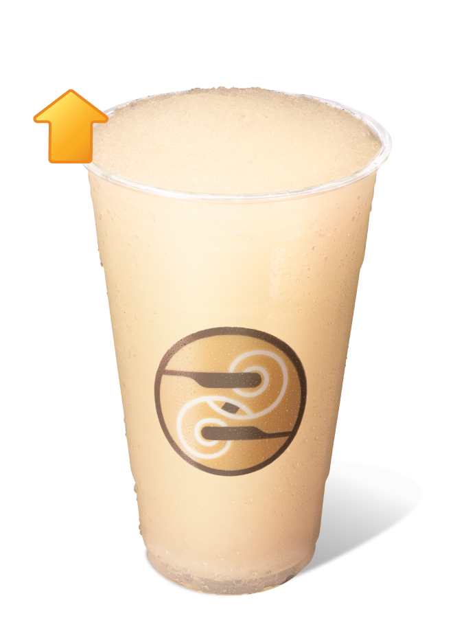 Ziggi's Coffee Frozen Protein Lemonade Smoothie in a clear cup with a pale yellow slushy consistency