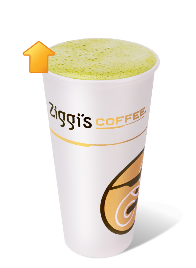 Ziggi's Coffee Hot Protein Matcha in a white branded cup with a vibrant green frothy top