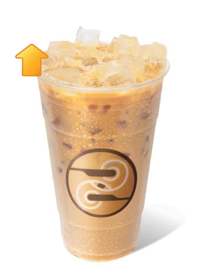 Ziggi's Coffee Iced Protein Fireside drink in a clear cup with ice and a warm golden caramel-toned base